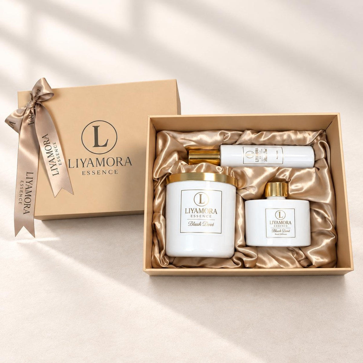 The opened gift box with the Blush Doré set by Liyamora Essence
